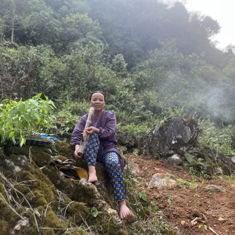 Farmer in Cao Bang resting and smiling